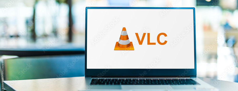Laptop computer displaying logo of VLC media player foto de Stock | Adobe  Stock