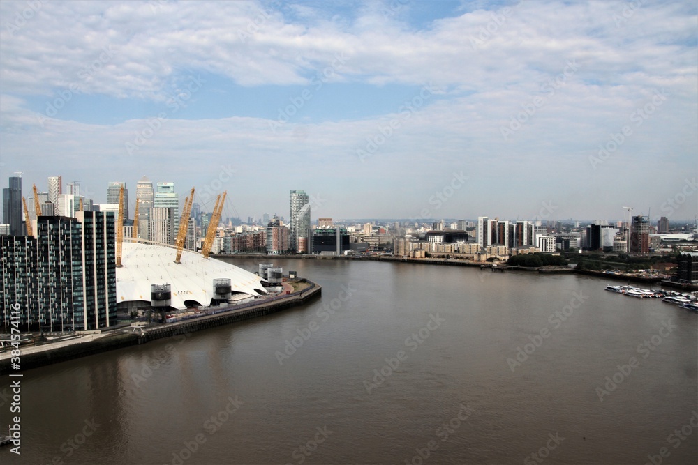 An aerial view of the River Thames in London at the Greenwich Peninsula