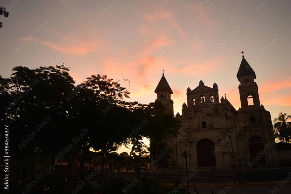 Fototapeta premium Sunset over the volcanic islands Isla Ometepe and the volcanoes of Léon in Nicaragua, Central America
