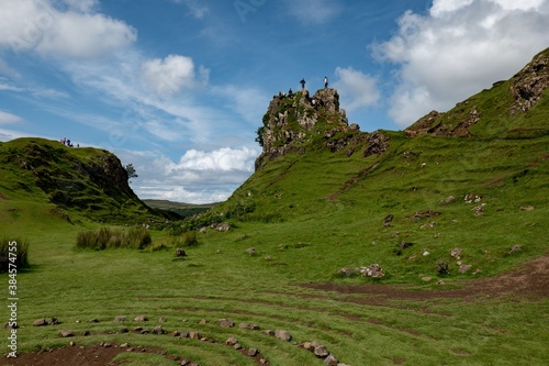 The landscape of rocks of Faerie Castle (Castle Ewen) at the Fairy Glen in Isle of Skye in Scotland with stone circle