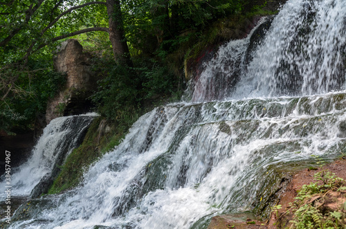 Scenic view of cascading 16 meters Dzhurinsky waterfall on the river Dzhurin. It is the largest in Ukraine plain waterfall. Nyrkiv  Ternopil region  Ukraine