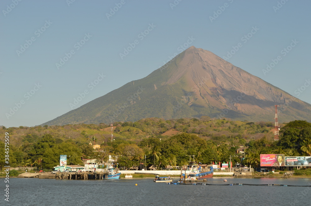 Sunset over the volcanic islands Isla Ometepe and the volcanoes of Léon in Nicaragua, Central America