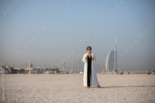 middle aged fashionable woman on Dubai Beach 