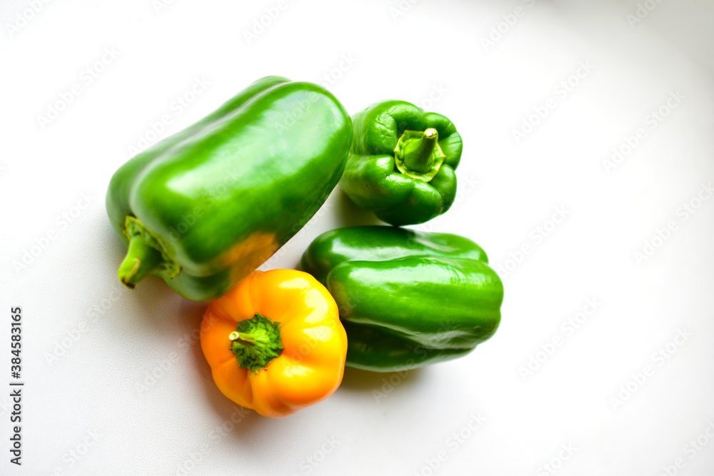 Yellow green regular pepper on a white background Yellow green regular pepper on a white background
