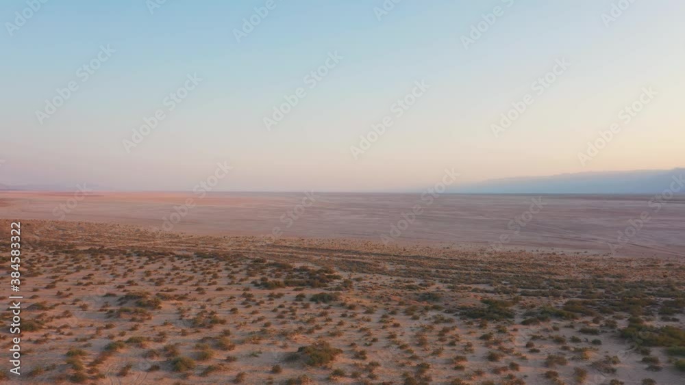 Entering the big desert of the laguna salada, salt lake, at Mexicali Baja California mexico, crossing the border from calexico california, looks like the end of the world Entering the big desert of the laguna salada, salt lake, at Mexicali Baja California mexico, crossing the border from calexico california, looks like the end of the world