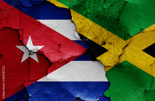 flags of Cuba and Jamaica painted on cracked wall