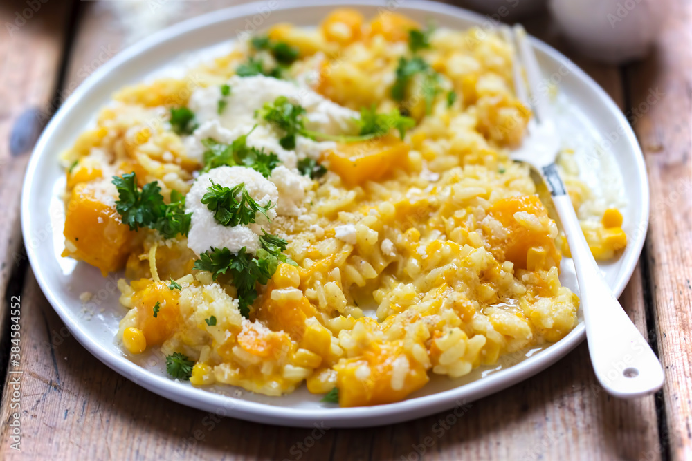 Pumpkin and sweet corn risotto with ricotta, parmesan and parsley Pumpkin and sweet corn risotto with ricotta, parmesan and parsley