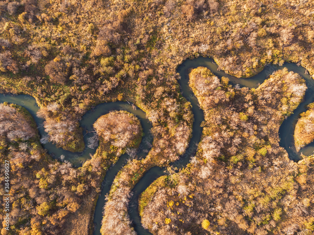 Aerial drone view of autumn landscape with river. Aerial drone view of autumn landscape with river.