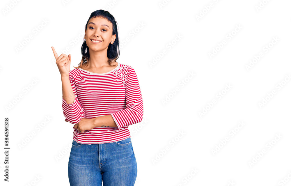 Young woman wearing casual clothes smiling happy pointing with hand and finger to the side Young woman wearing casual clothes smiling happy pointing with hand and finger to the side