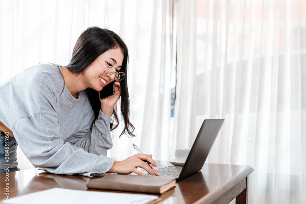 High school or college student learning tutoring on desk and reading, doing homework, lesson practice preparing exam on laptop at home. Education concept. High school or college student learning tutoring on desk and reading, doing homework, lesson practice preparing exam on laptop at home. Education concept.
