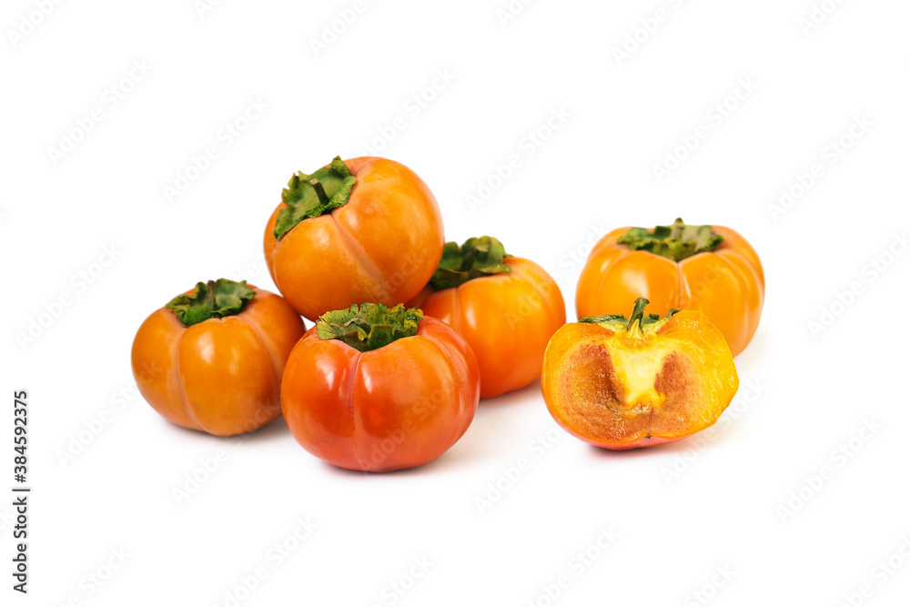 Persimmon fruits isolated on white background, Diospyros kaki wholes and half Persimmon fruits isolated on white background, Diospyros kaki wholes and half
