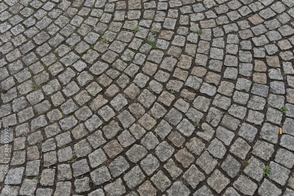 Background of arched laid cobblestone pavement Background of arched laid cobblestone pavement