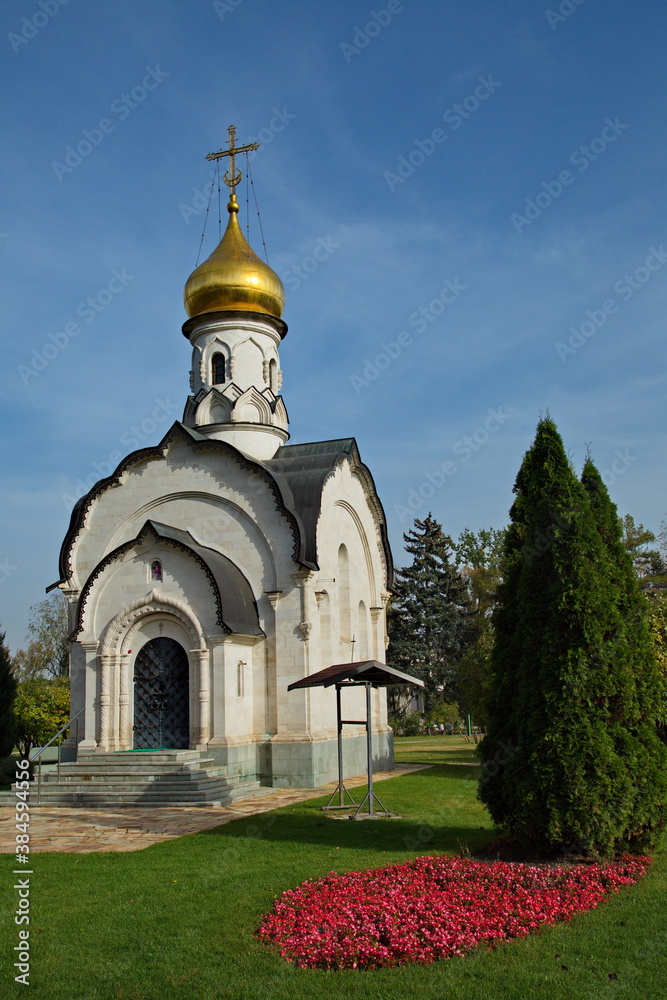 Fototapeta premium Orthodox church in the city park 