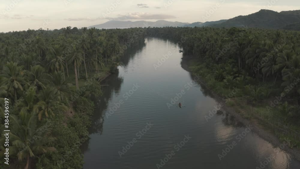 The Stunning Scenery Of A Calm Water In The Philippines Surrounded By Green Trees - Aerial Shot The Stunning Scenery Of A Calm Water In The Philippines Surrounded By Green Trees - Aerial Shot