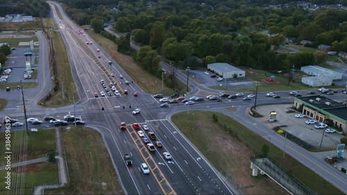 Time lapse at a busy intersection during twilight photo