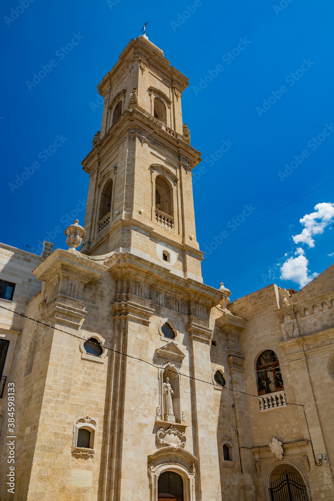 Gravina in Puglia, Italy. The ancient convent of San Francesco with its bell tower, and the rose window, located in a small square.