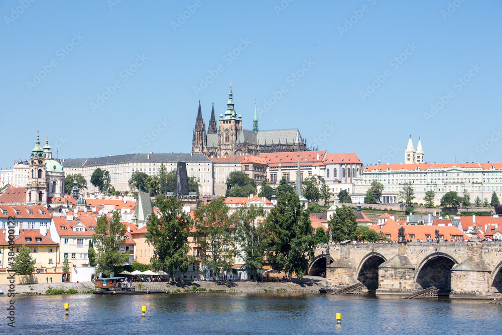 Charles bridge and prague castle sunny panorama old town