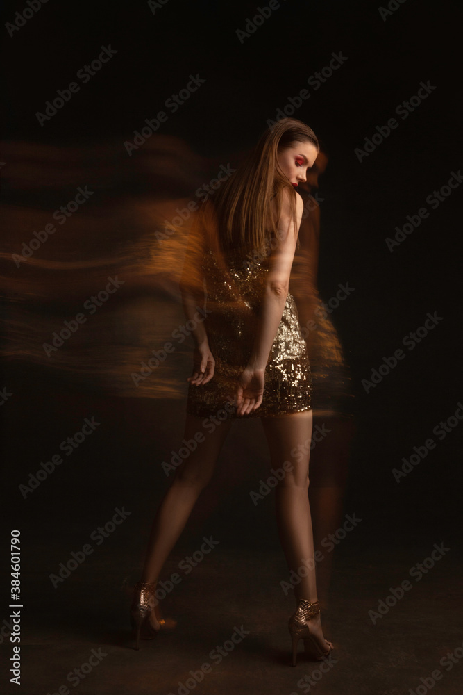 Fototapeta premium Portrait Of Sexy Young Glamorous Female Model in Shiny dress with Red Sexy Full Lips. Multiple exposure.