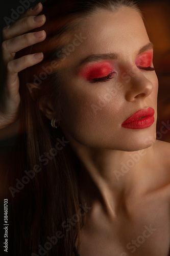 Close Up Of Sexy Young Glamorous Female Model with Red Sexy Full Lips. Beauty Face. Beautiful Woman With Red Makeup