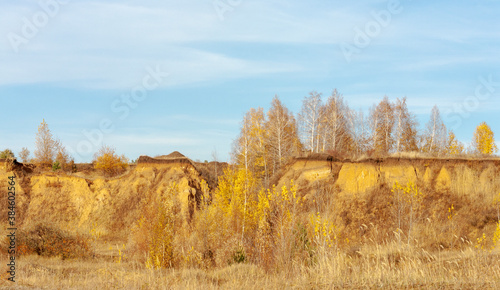 Autumn landscape on the slopes of a sandy steep.
