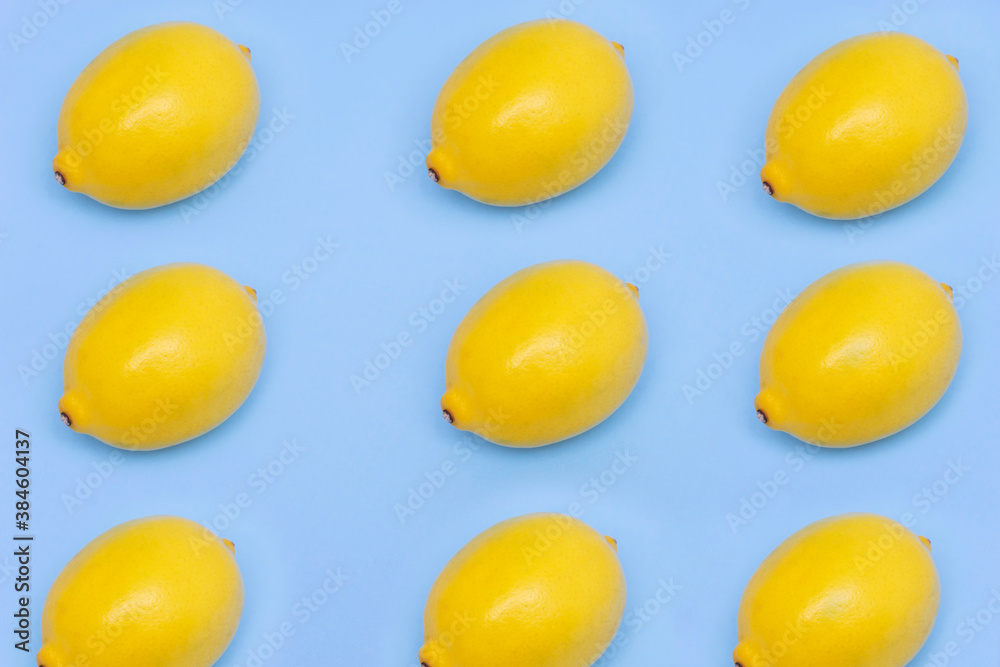 Yellow lemons isolated on blue background Yellow lemons isolated on blue background