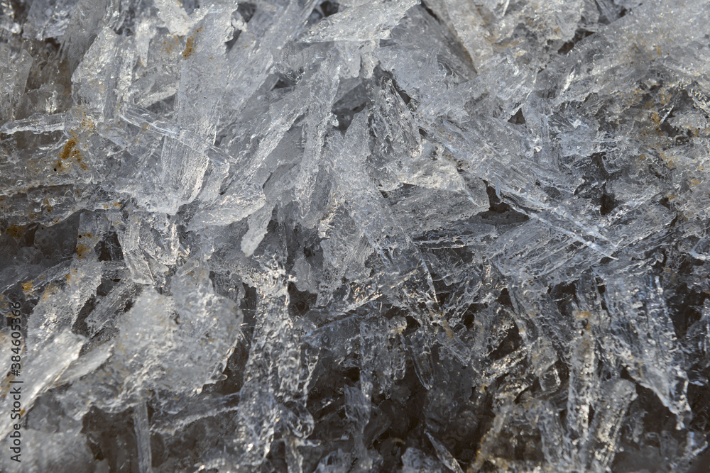 Fototapeta premium Surface with melting ice crystals of various shapes