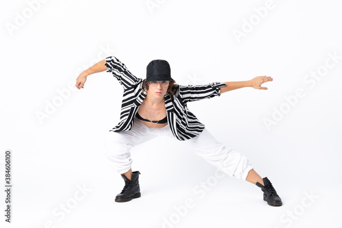 Woman dancing over isolated white background