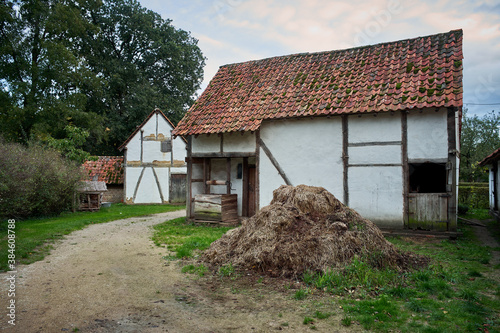 Ancient farm with manur in Belgium photo