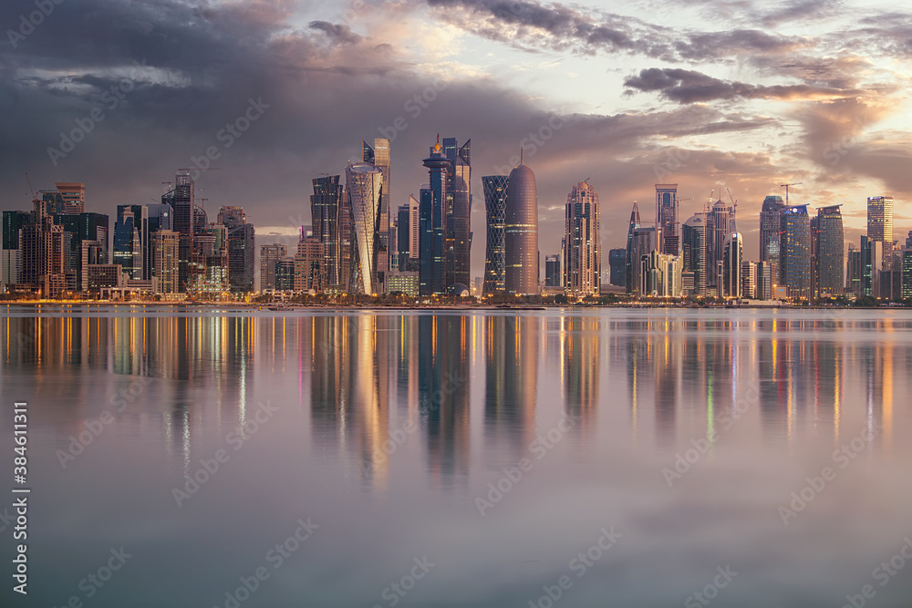 The skyline of Doha, Qatar during sunset