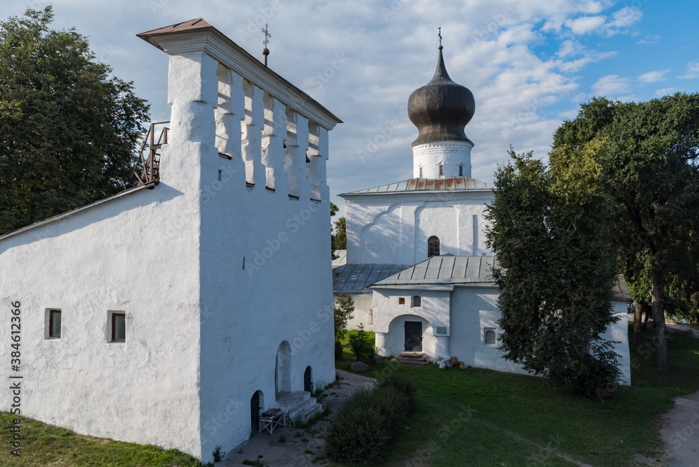 Assumption church from Paromenya (Uspenskaya church, XVI century) and its bell tower. Pskov city, Pskov Region (Pskovskaya oblast), Russia.