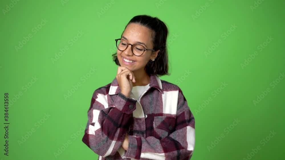 woman looking up on green screen chroma key background
