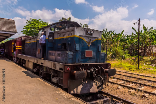 A train at Rambukkana Station on the Kandy to Col0mbo mainline railway in Sri Lanka, Asia