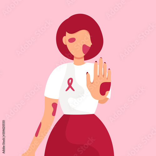 Young girl with bruises and abrasions raised her hand up and shows a stop violence sign