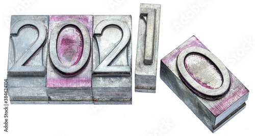 year 2001 is replacing 2020 - number abstract in gritty vintage letterpress metal types isolated on white, calendar and New Year concept photo