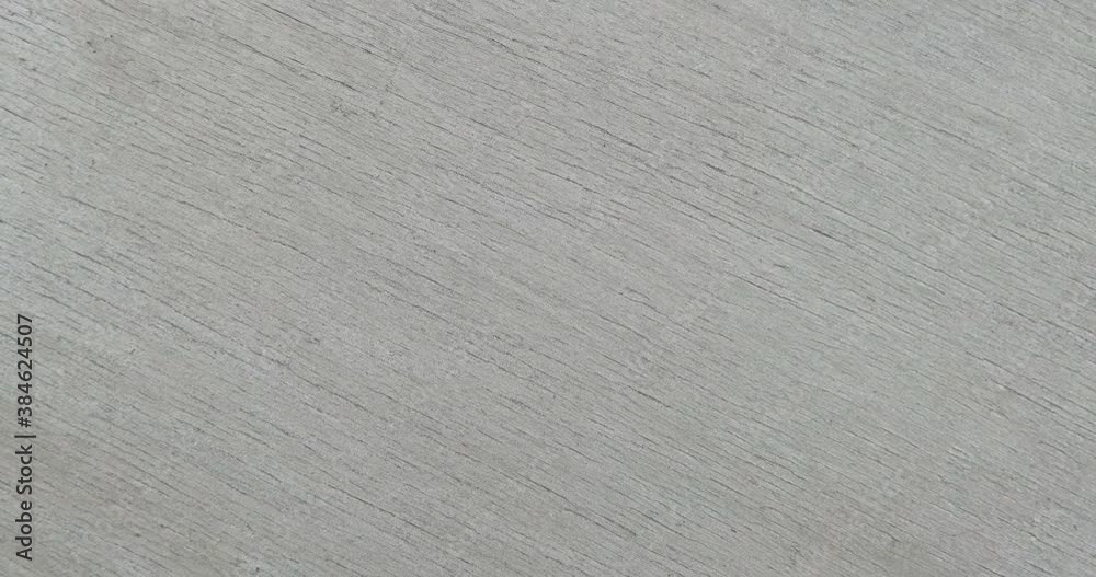Rotating silver background. Top view. Silver paint, background and texture