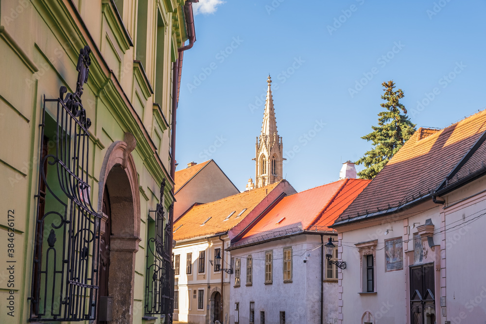 The tower of Clarissine Klarisky Church and Monastery. Bratislava. Capital of Slovakia. Gothic church architecture against blue sky