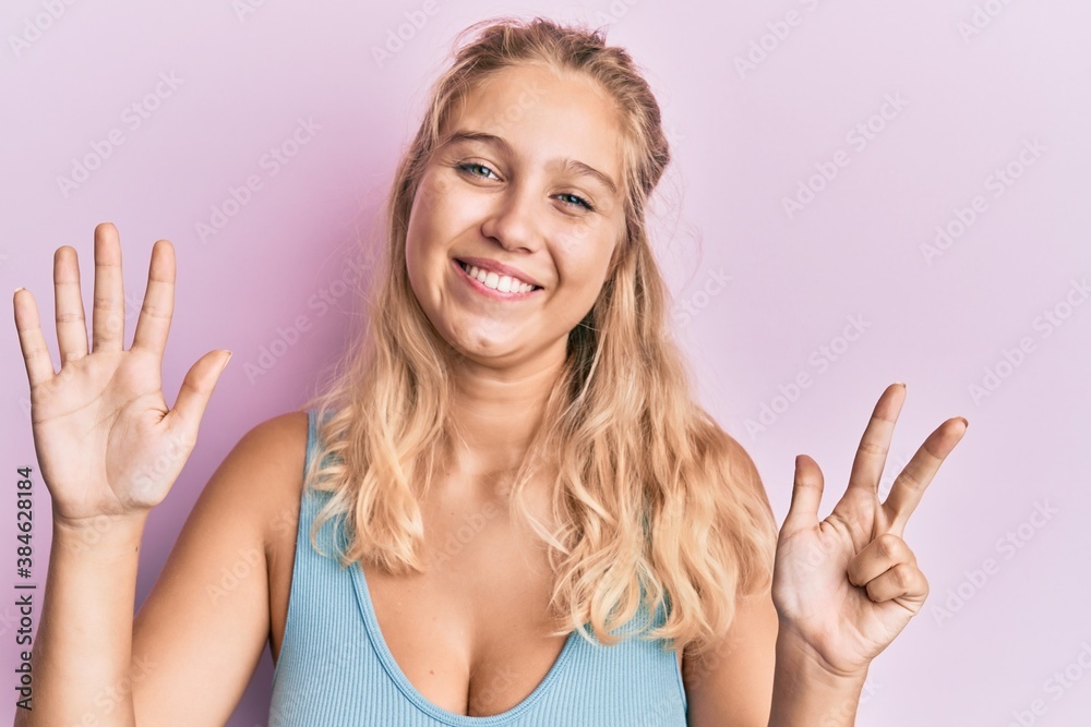 Young blonde girl wearing casual clothes showing and pointing up with fingers number eight while smiling confident and happy. Young blonde girl wearing casual clothes showing and pointing up with fingers number eight while smiling confident and happy.