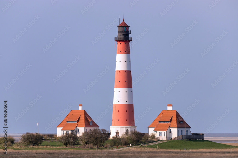 Westerheversand lighthouse in Schleswig-Holstein, Germany. Considered to be one of the best-known lighthouses in northern Germany, it was built in 1908.