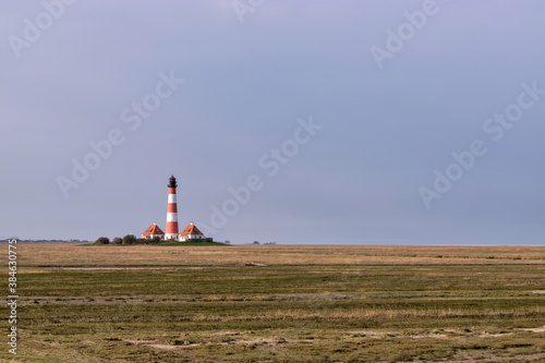 Westerheversand lighthouse in Schleswig-Holstein, Germany. Considered to be one of the best-known lighthouses in northern Germany, it was built in 1908.