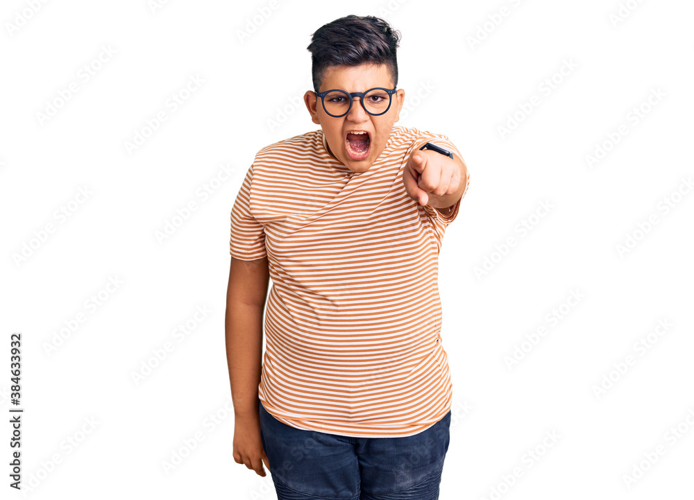 Fototapeta premium Little boy kid wearing casual clothes and glasses pointing displeased and frustrated to the camera, angry and furious with you