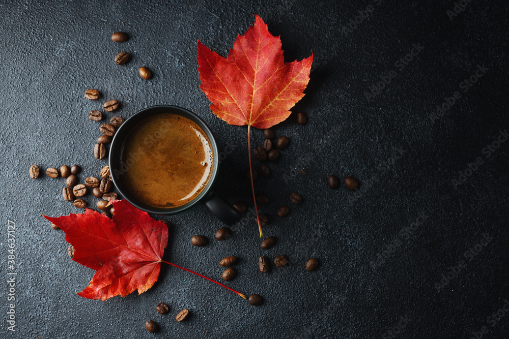 Coffee in cup with autumn leaves Coffee in cup with autumn leaves