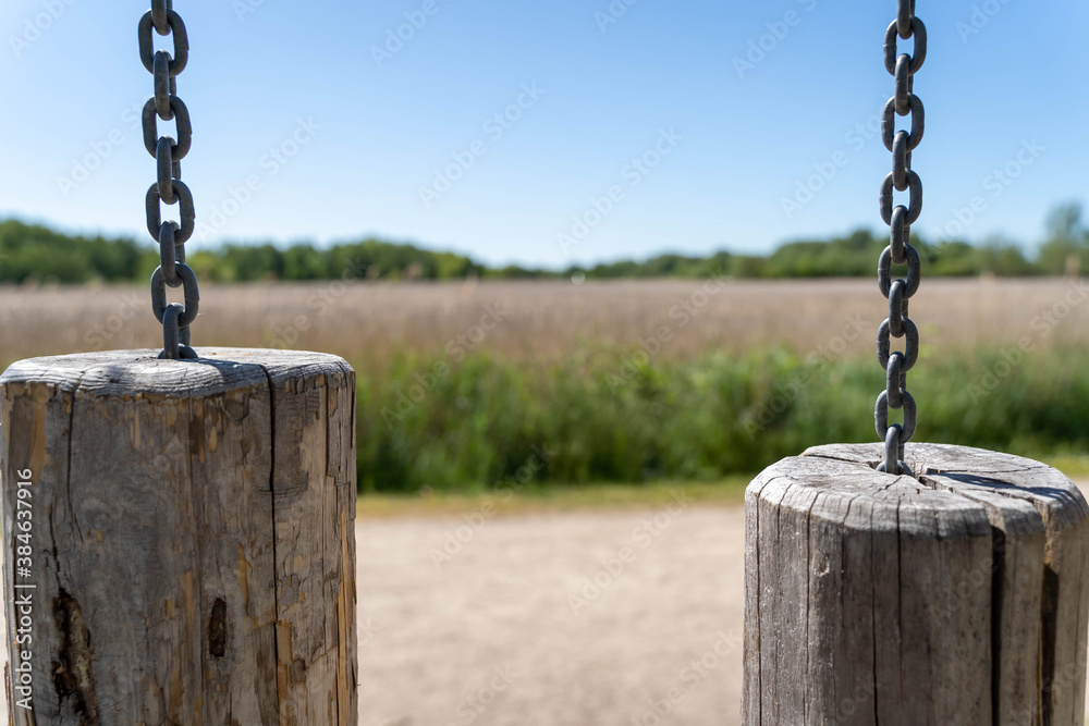 Wooden carillon (chime) on a playground in a park area Wooden carillon (chime) on a playground in a park area