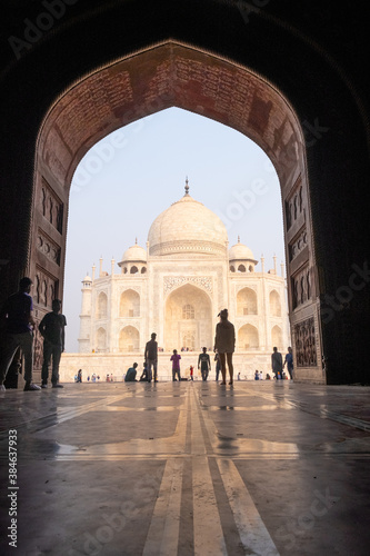 Taj Mahal image at a different angle with tourists foggy sky