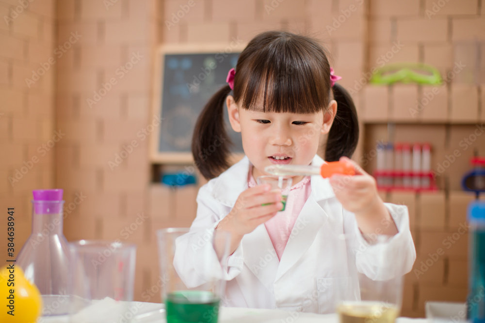 young  girl  play science experiments for homeschooling