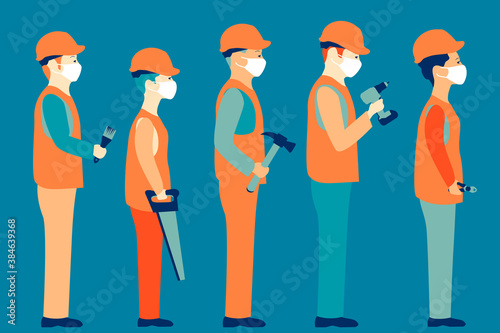 Construction workers in white medical mask during coronavirus COVID-19 pandemic. Workers with various building tools. 