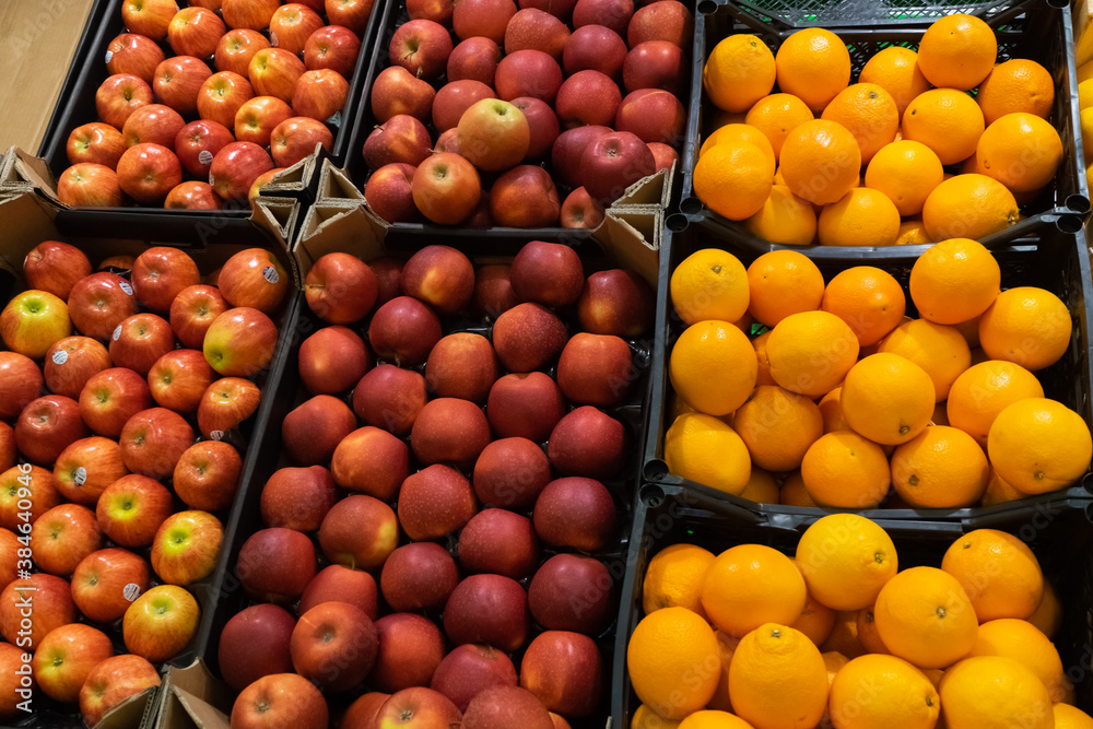 Apple, carrot and orange vitamin street-market showcase.