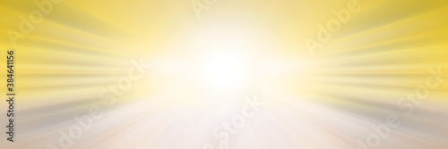 Abstract yellow background. Bright flash of light. Light explosion from central point. Holy magic glow. Sparkling Rays of Light.
