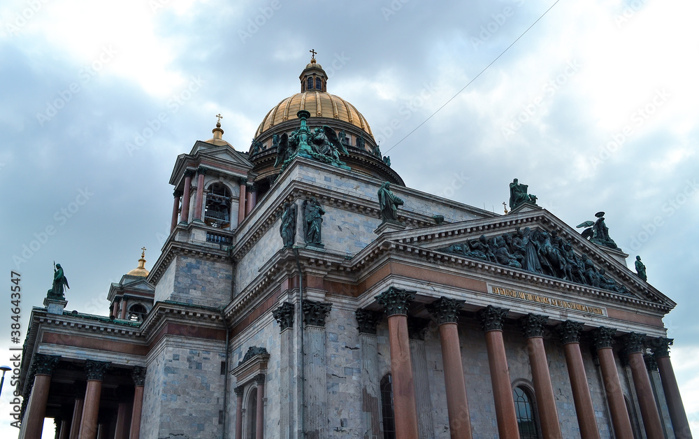 Isaac's Cathedral, Saint Petersburg, Russia, 11.10.2020. The building in style of classicism. Facade, exterior with columns, sculpture, statues and relief. Gold dome.