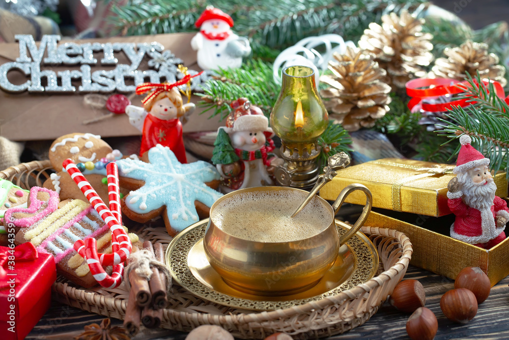 Merry Christmas card with gifts and, coffee and Christmas decorations.