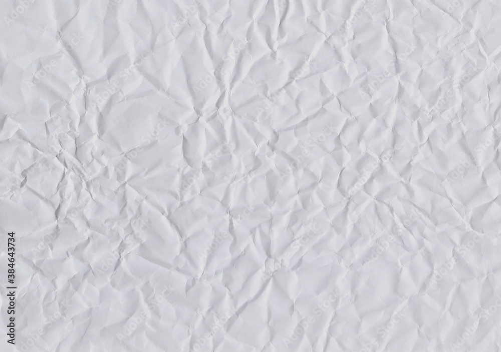 Fototapeta premium Closeup crumpled light grey paper texture background, texture. Grey paper sheet board with space for text ,pattern or abstract design backdrop.